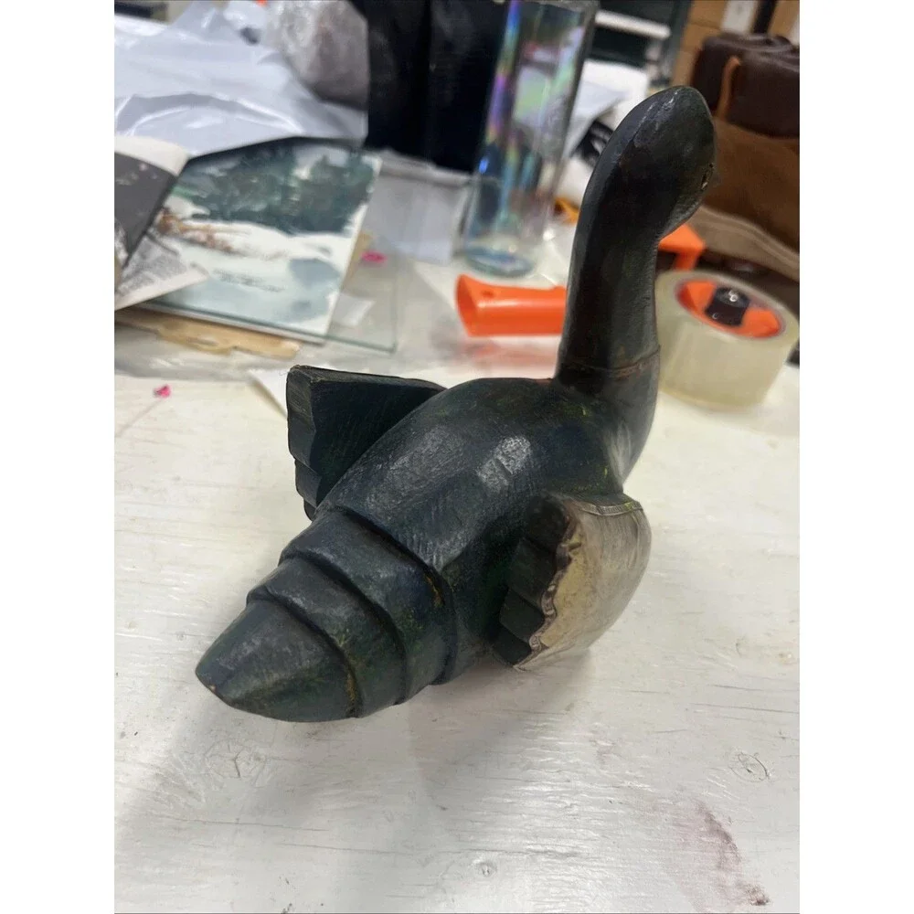 Unique wood and metal carved duck